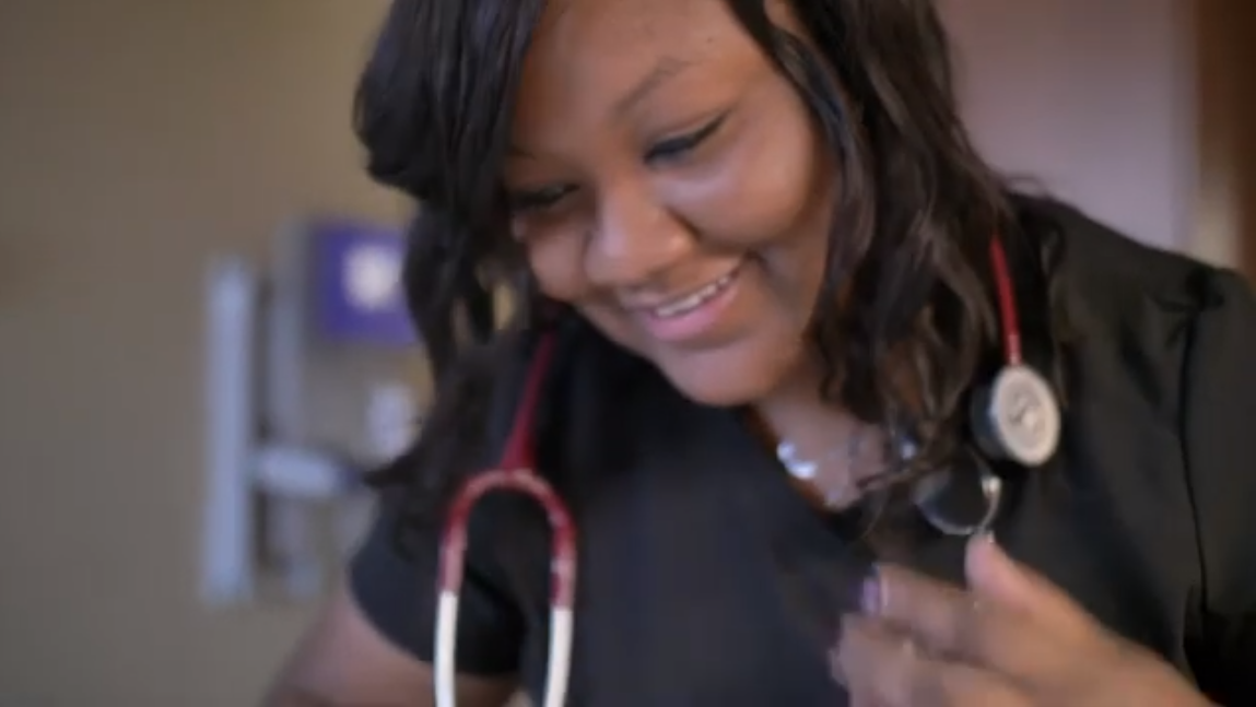 SRHS Nurse smiling down at her patient